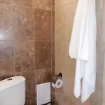 Megi Apartments, Sity