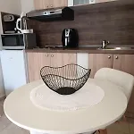 Megi Apartments, Sity